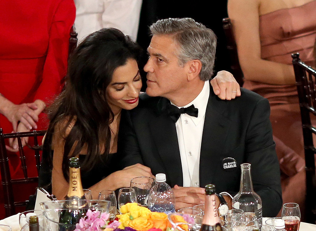 Amal Alamuddin cuddled up George Clooney