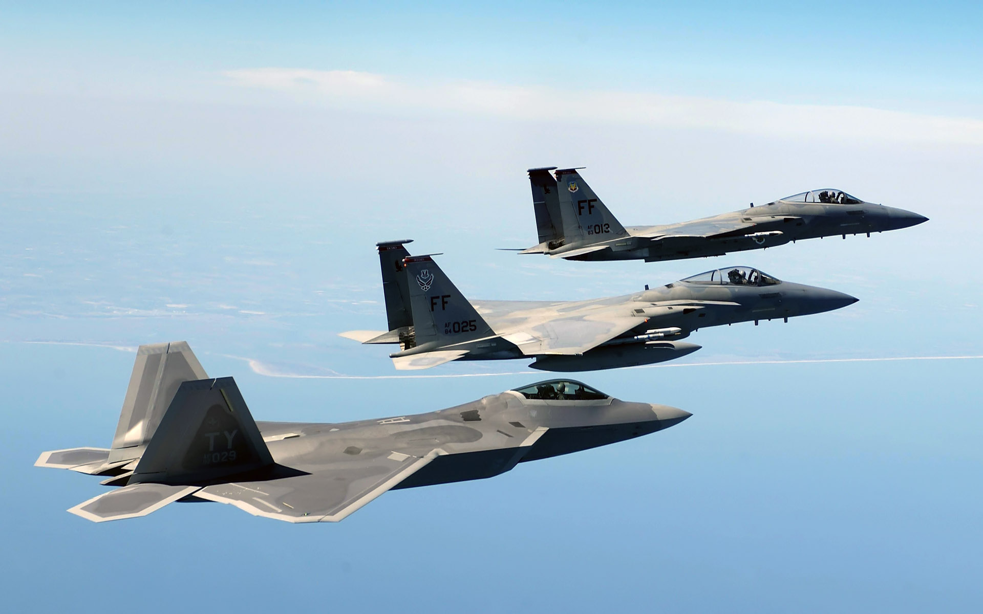 an fa 22 raptor two f 15 eagles wide